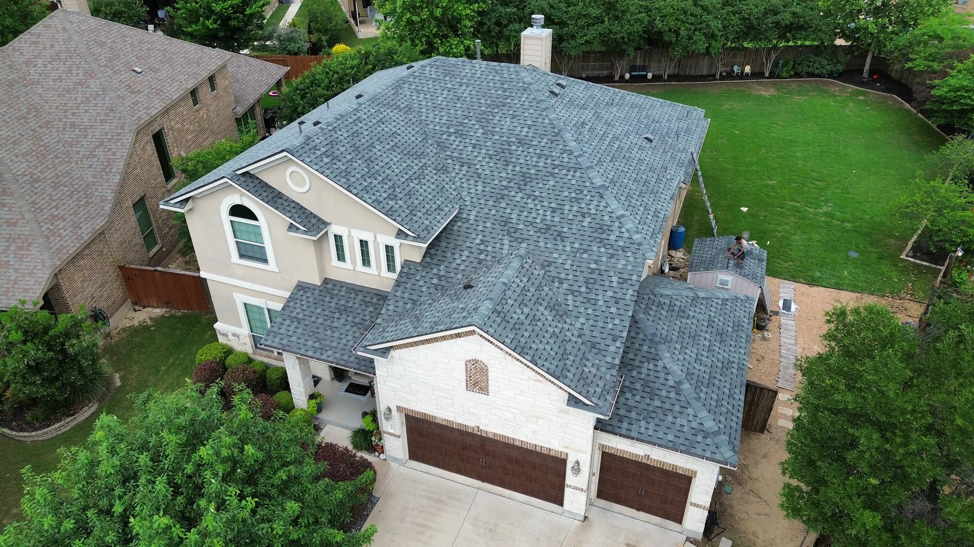Aerial gray shingle roof replacement, Hutto, TX