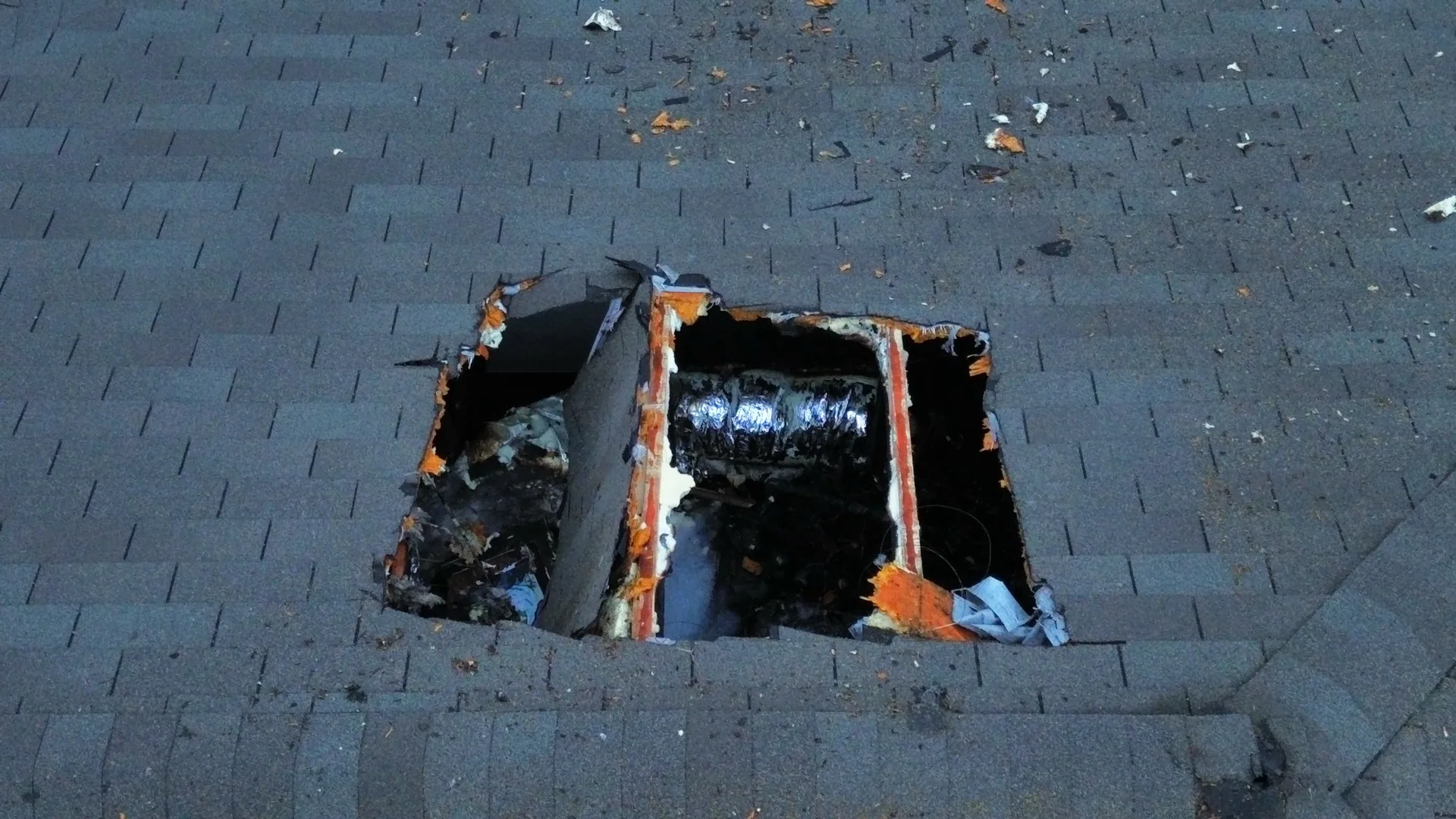 Close up roof hole exposed attic, Hutto, TX
