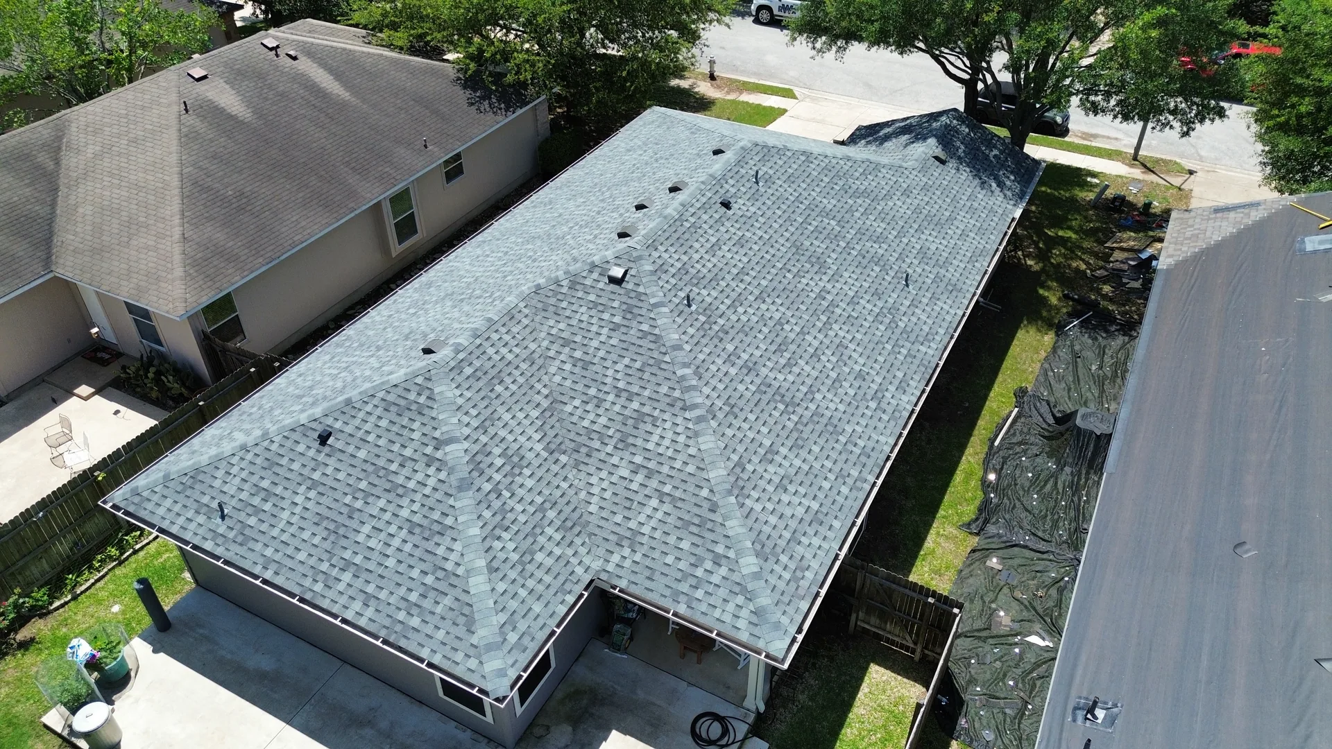 New shingle roof beside tear off, Hutto, TX